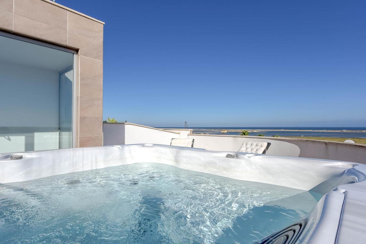Penthouse Quilha Apartment Fuzeta Exterior photo